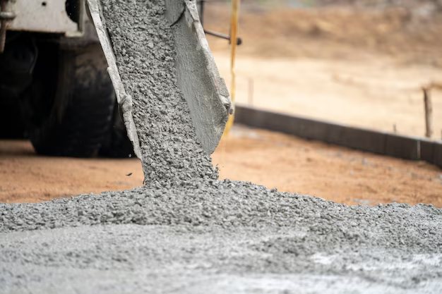 construction-worker-pouring-wet-concret-road-construction-site_33835-1156-_1_